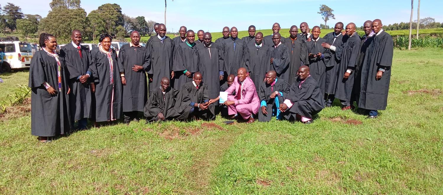 Certificate of Theology graduates in academic gowns after the ceremony